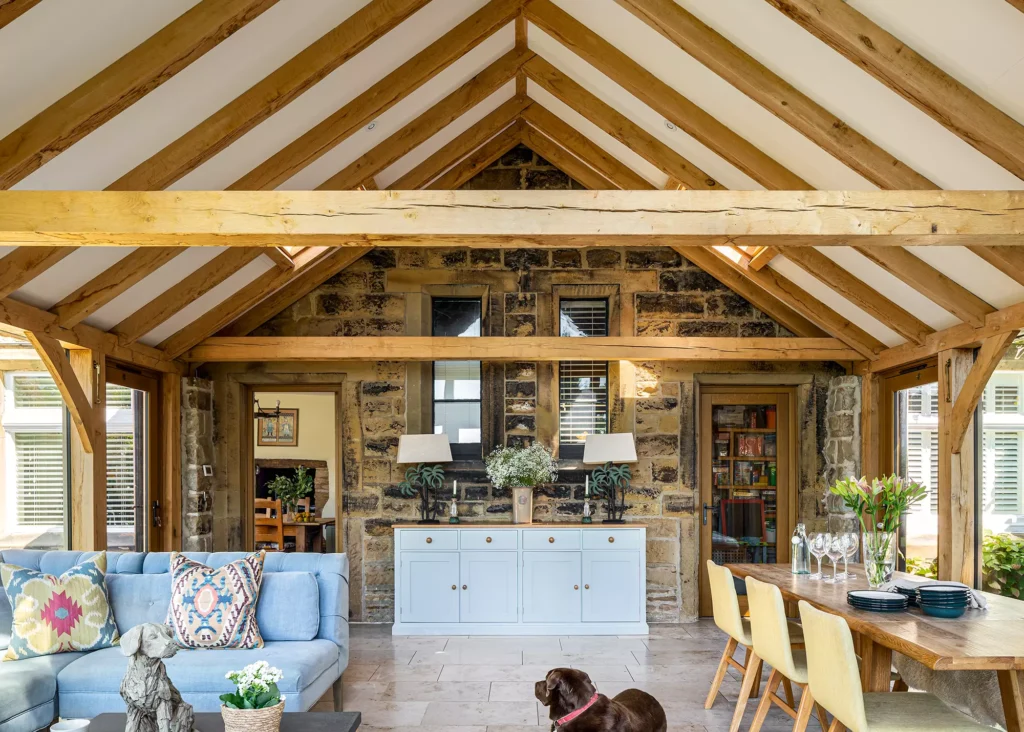 oak conservatory with exposed beams and trusses