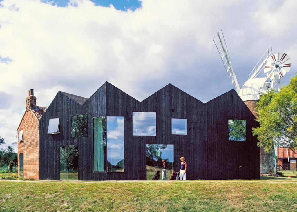 blackened timber clad extension