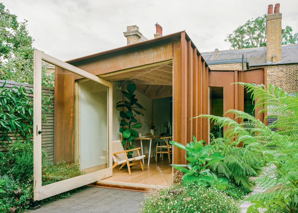 garden office with glass pivot door 