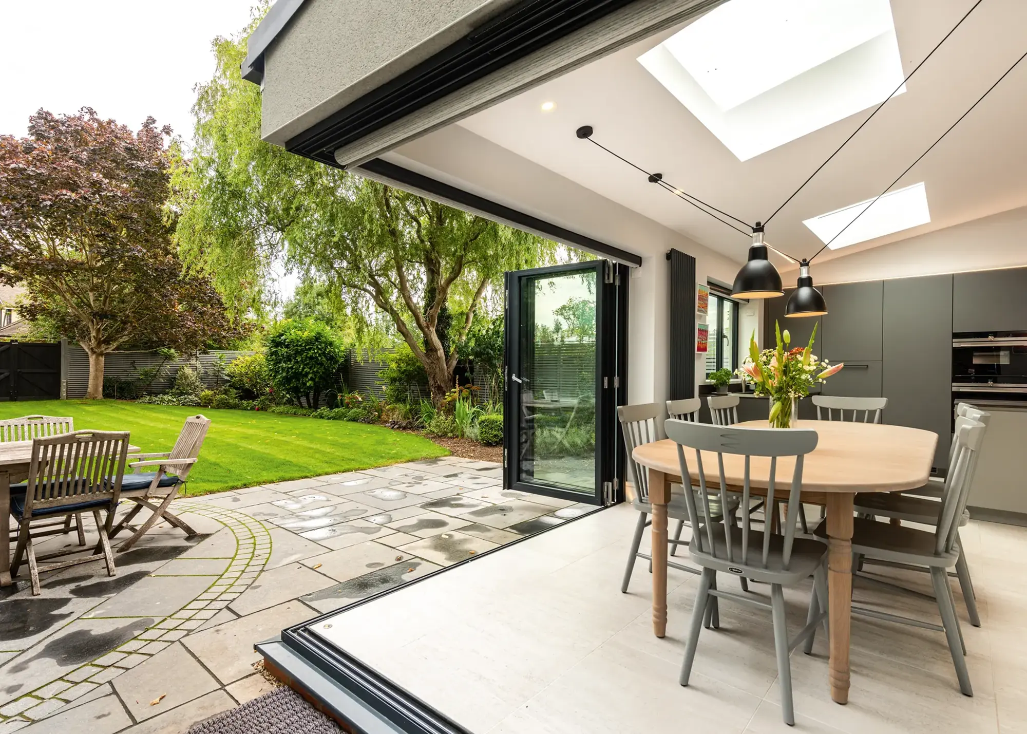 Seamless indoor-outdoor connection created with corner bifold doors
