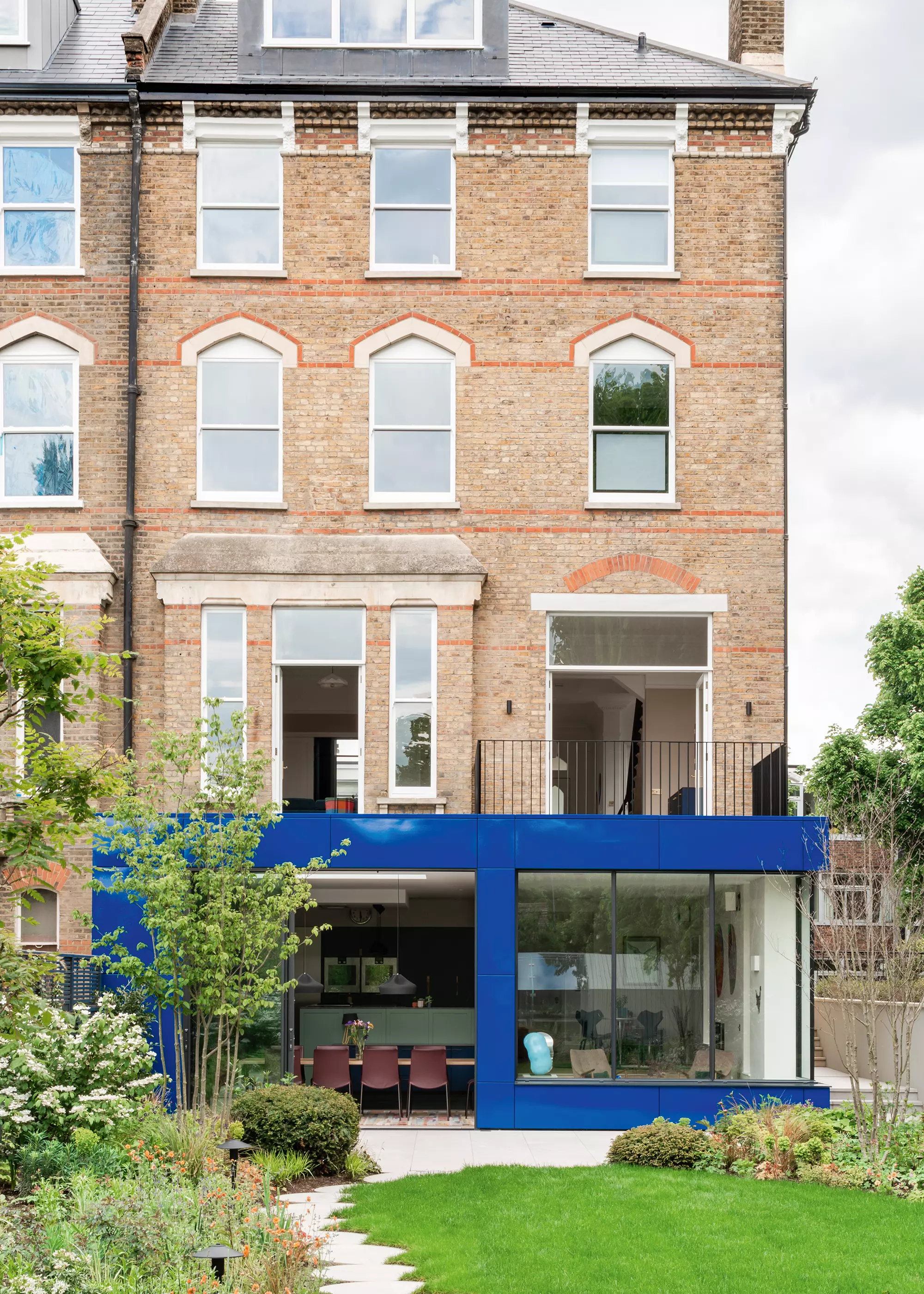 Bright blue extension to period home