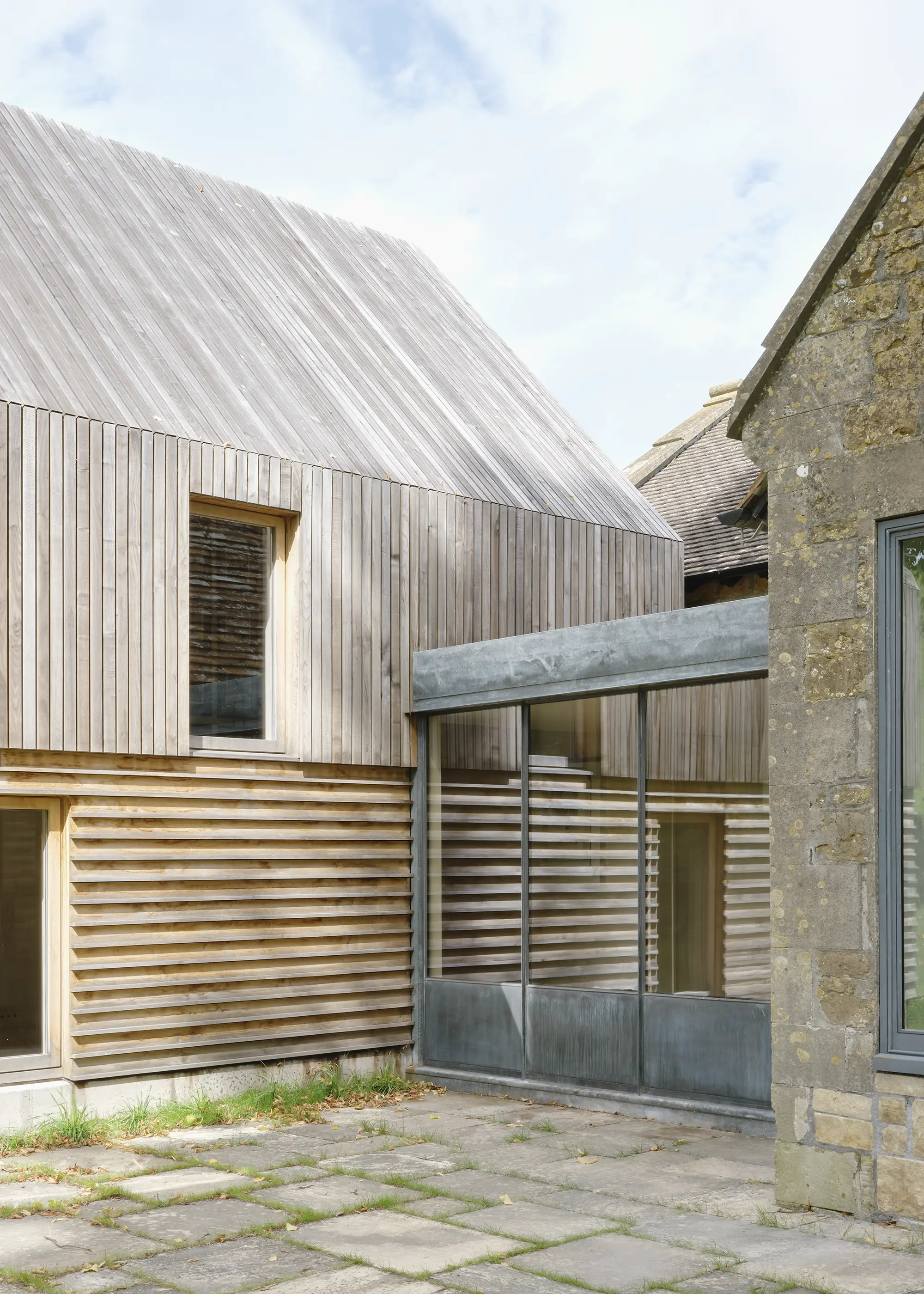 Timber-Clad Two-Storey Extension Linking Old & New