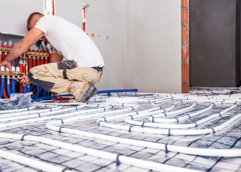 Underfloor Heating Beginner’s Guide: UFH being connected to the manifold