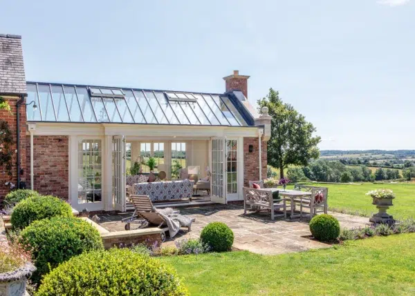 Traditional conservatory extension with bifold doors
