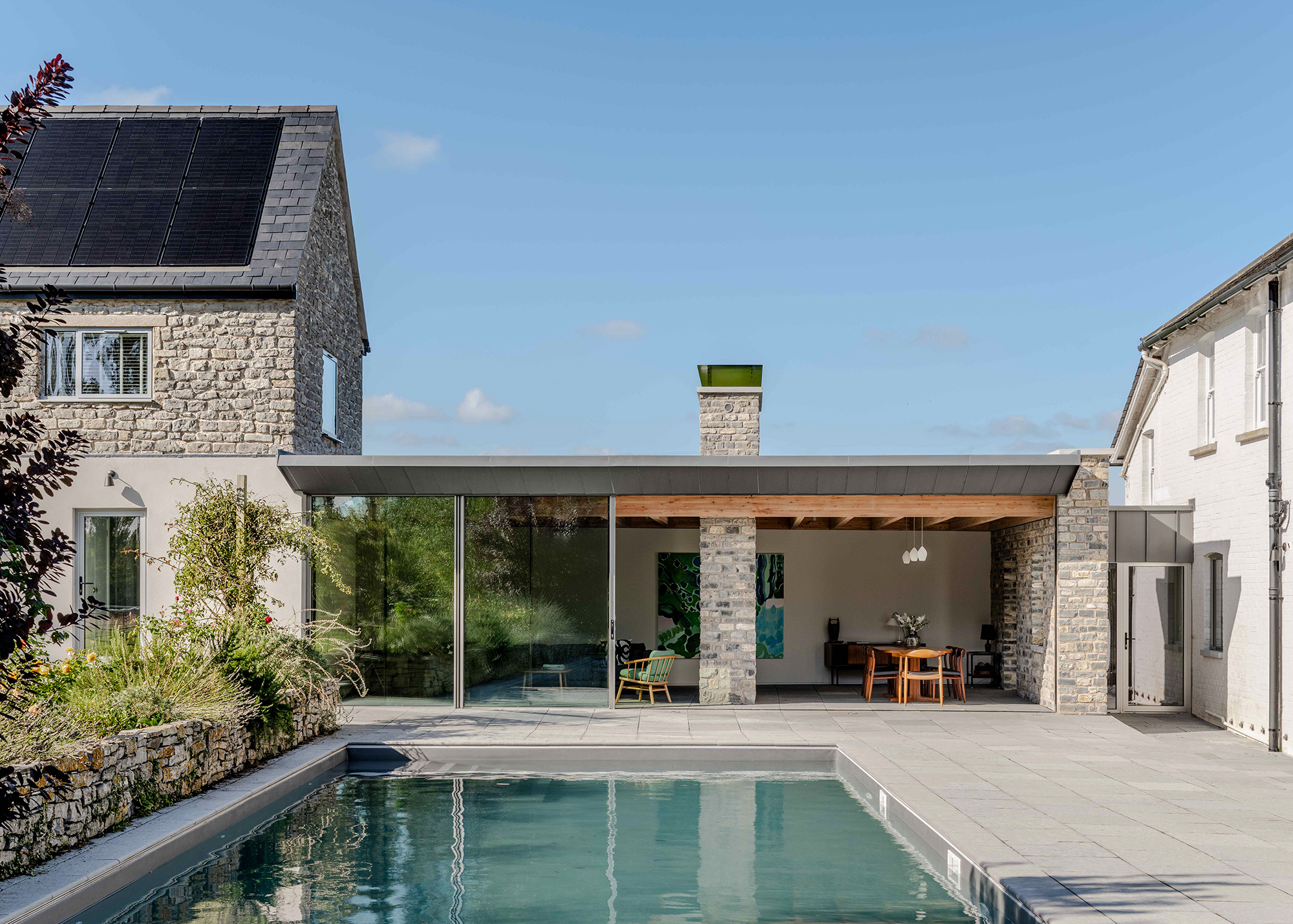 Spectacular glazed link extension connecting renovated farmhouse buildings