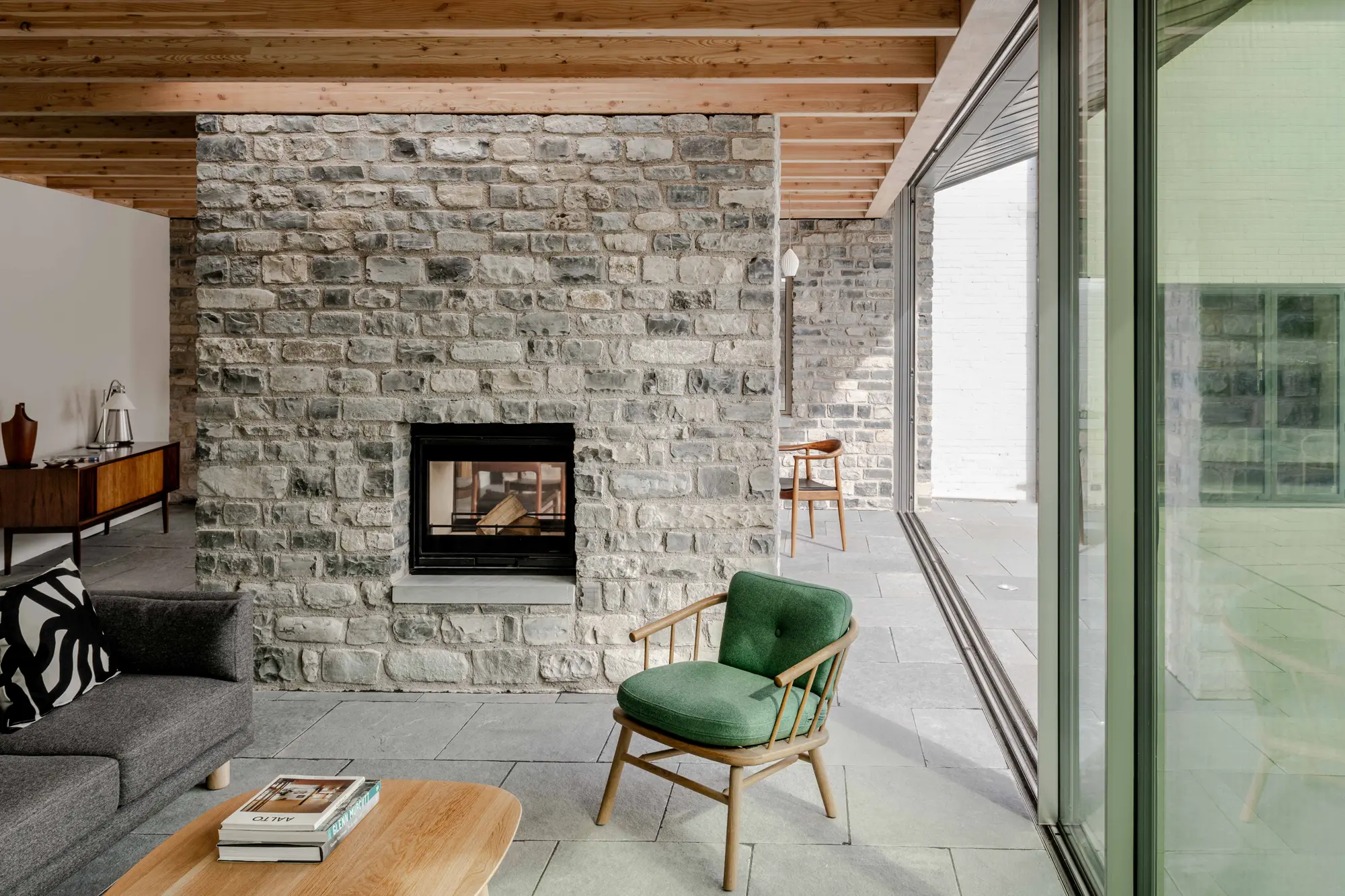 Spectacular glazed extension connecting renovated farmhouse buildings