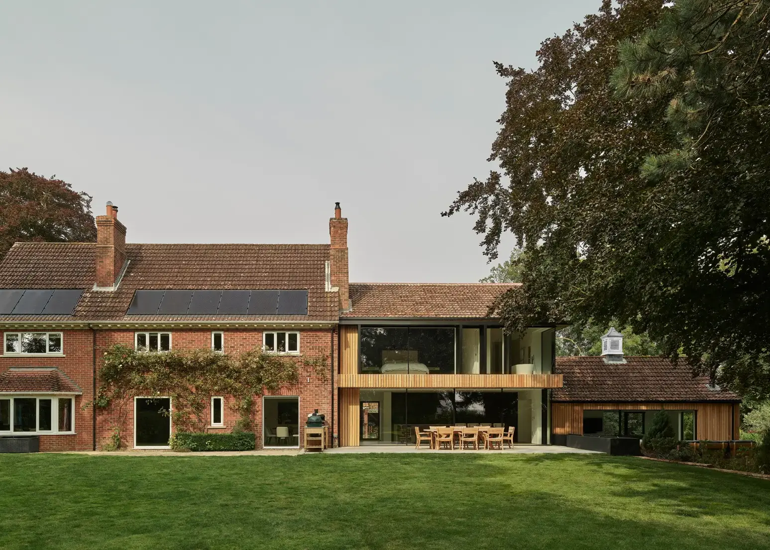 Existing house upgraded with a unique, two-storey timber-clad extension