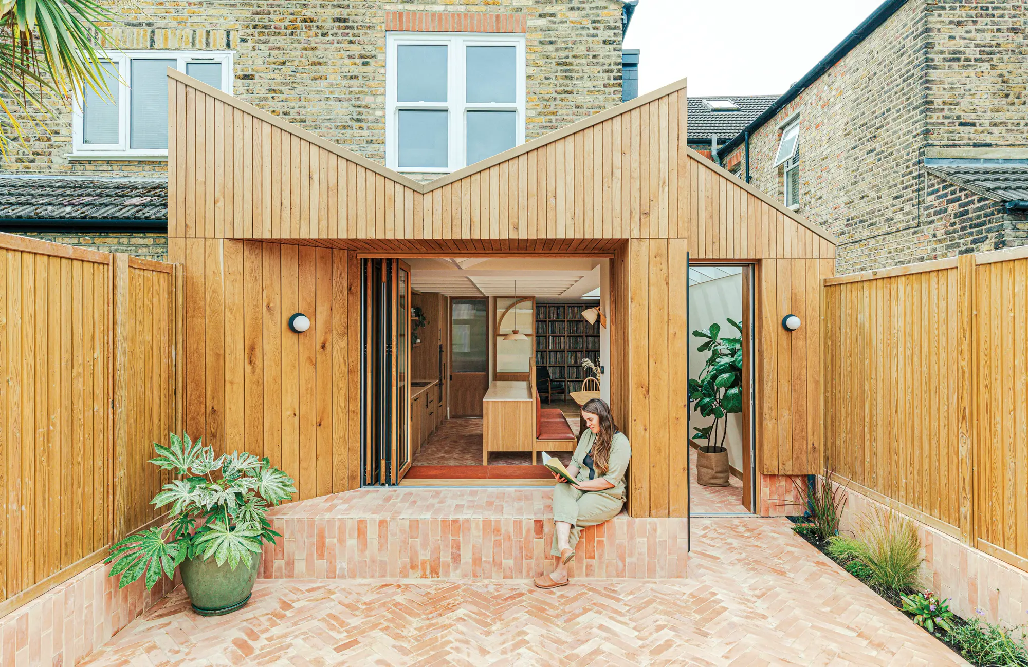 Striking timber-clad extension with a modern interior