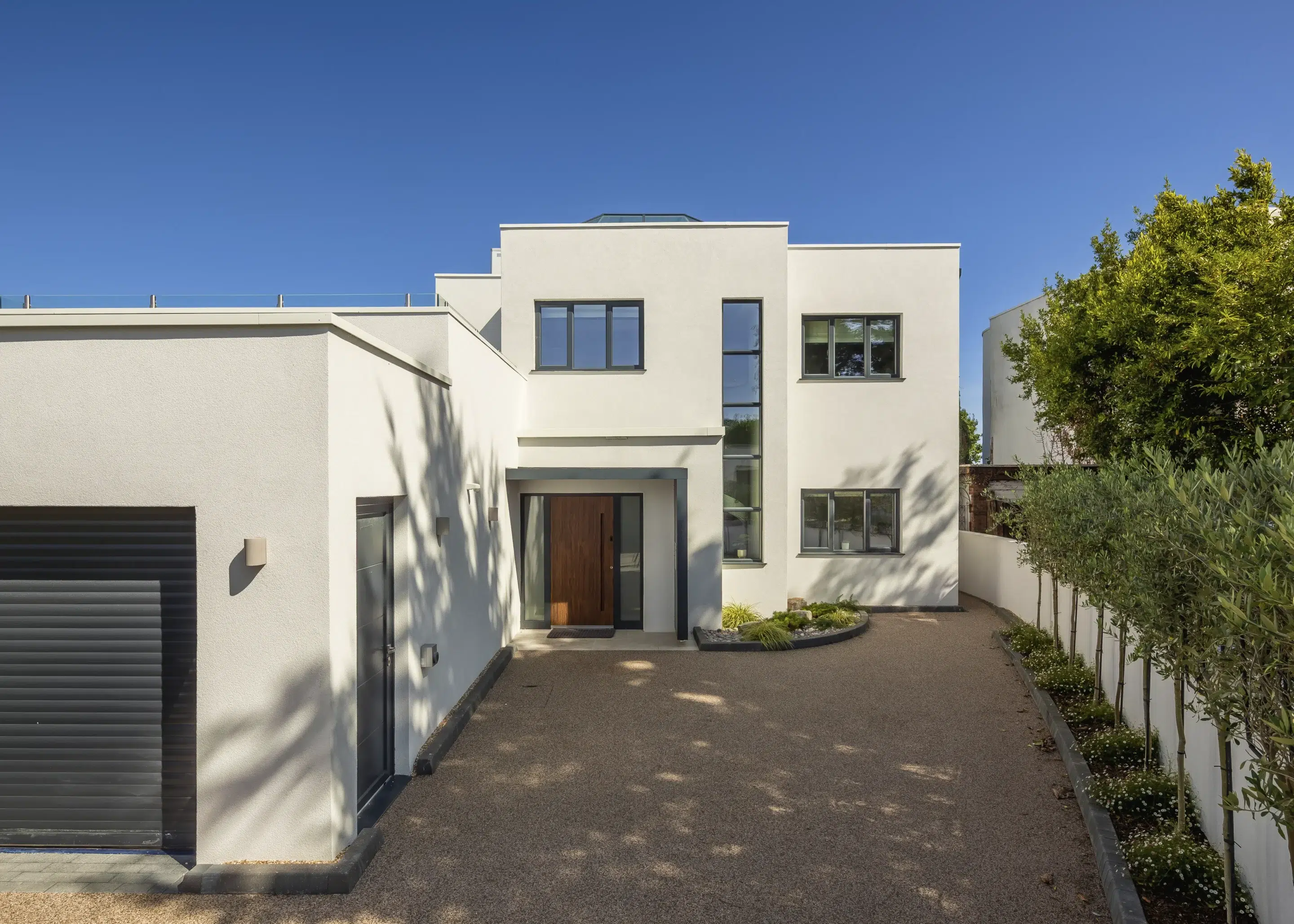 Bauhaus-Inspired Knock Down & Rebuild ICF Home