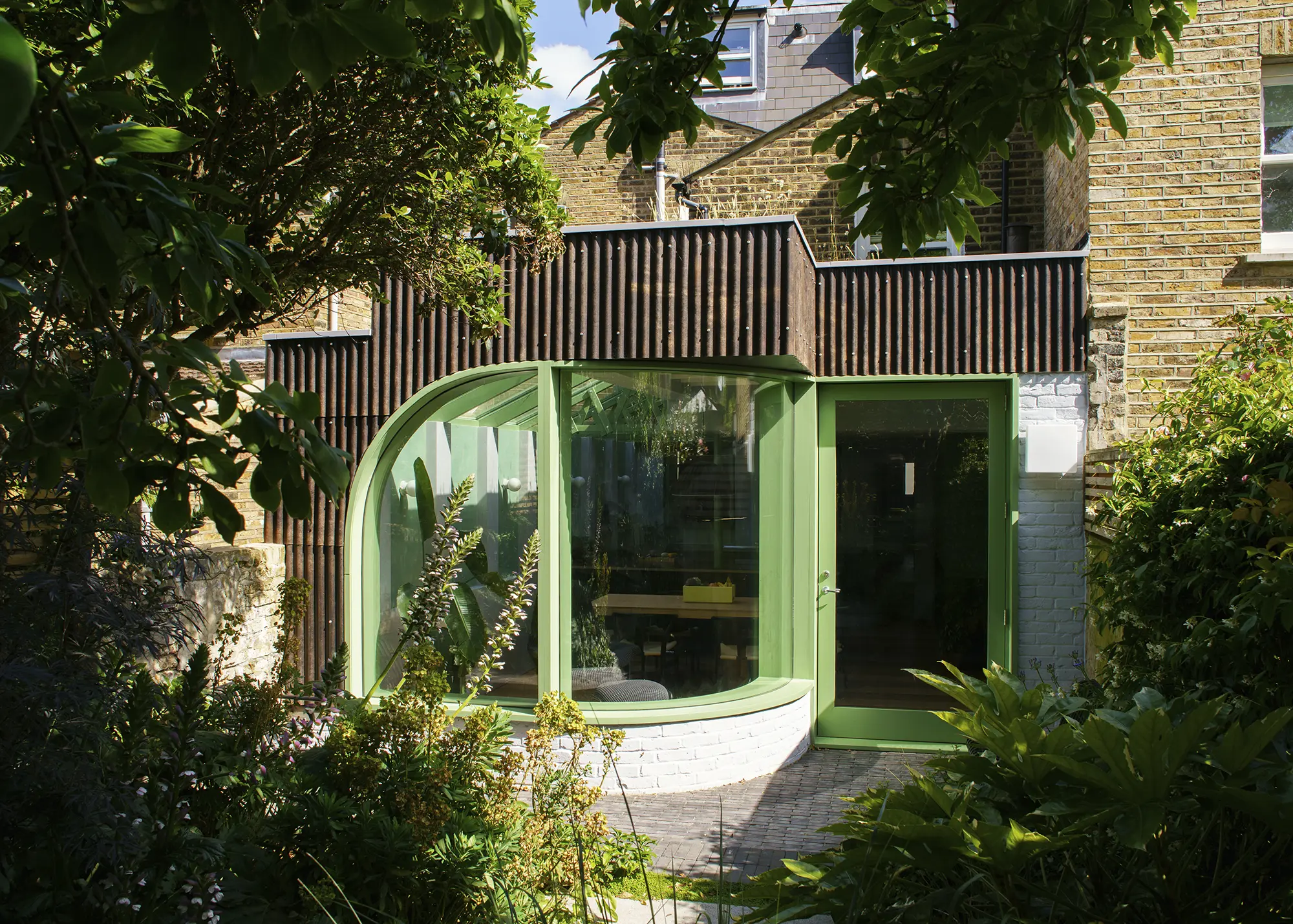 Colourful Wraparound Kitchen Extension Idea for a North London Home