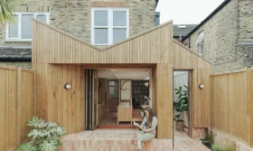 Timber-Clad Kitchen Extension with a Striking Coffered Ceiling