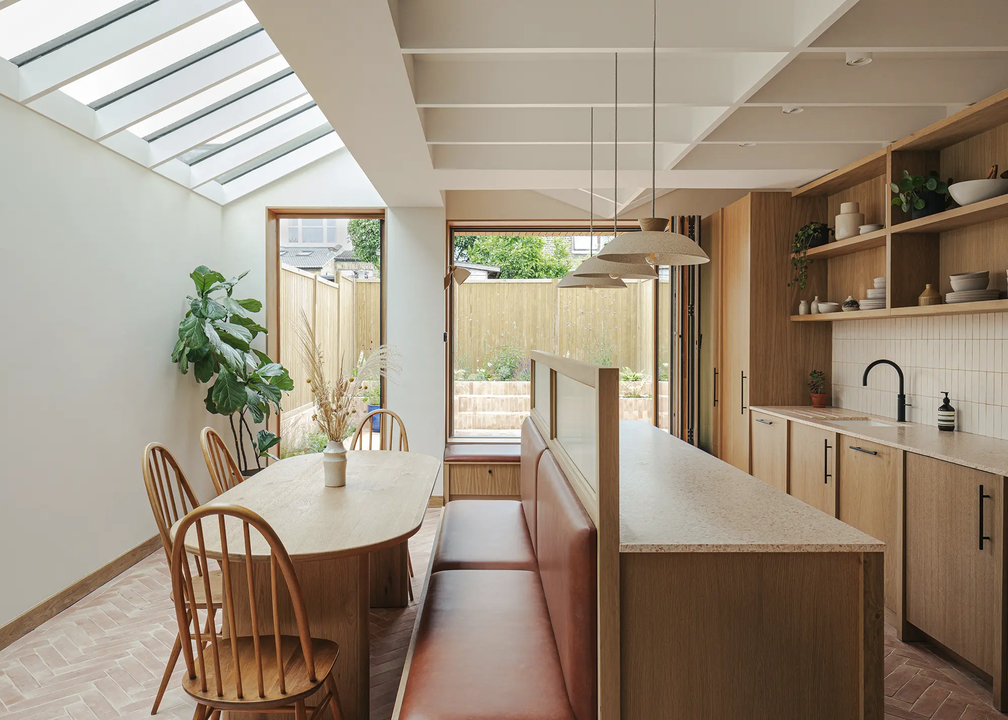Timber-Clad Kitchen Extension with a Striking Coffered Ceiling