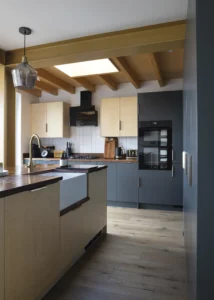 1950s House Opened Up to the Garden with a Timber-Clad Extension