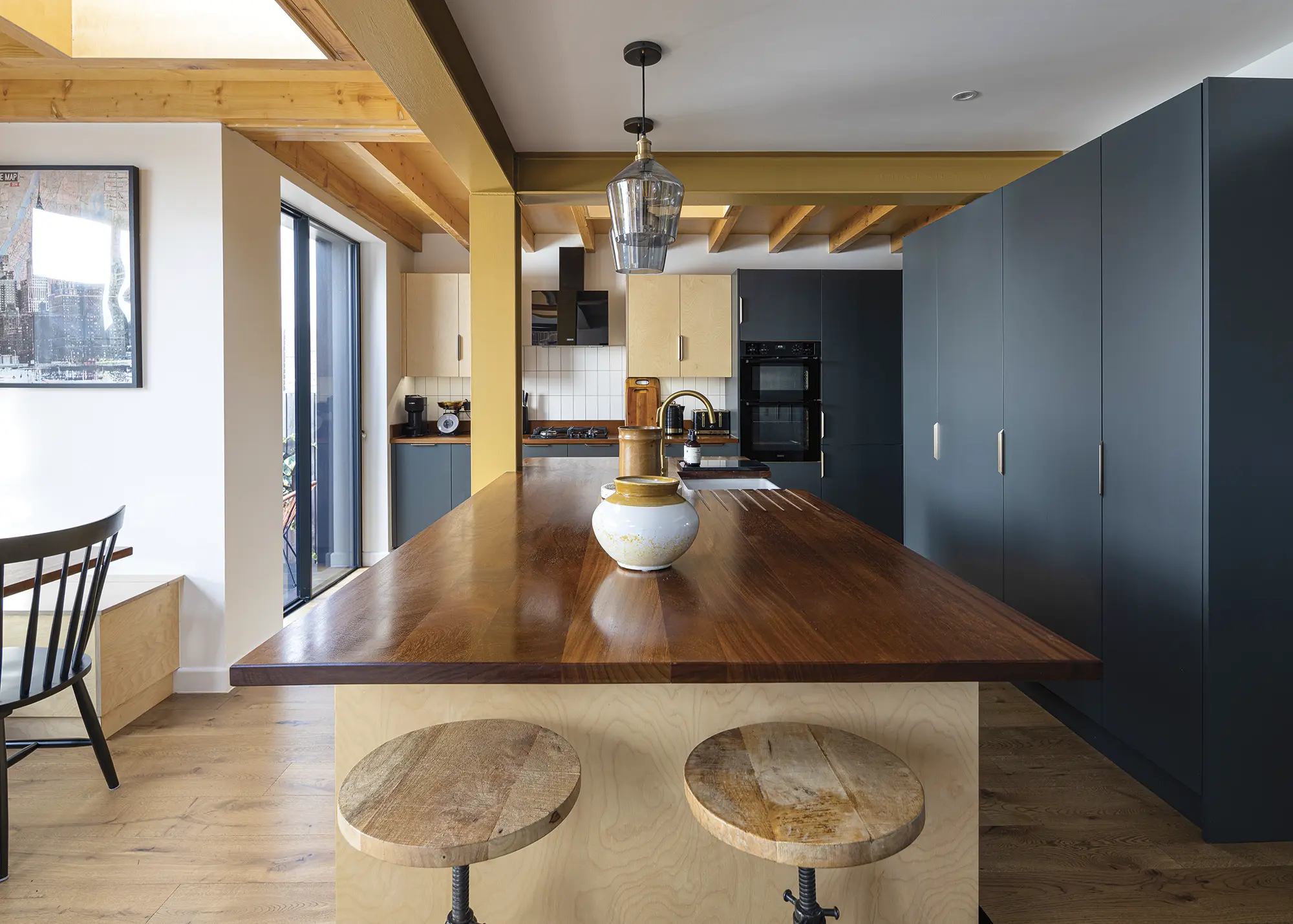 1950s House Opened Up to the Garden with a Timber-Clad Extension