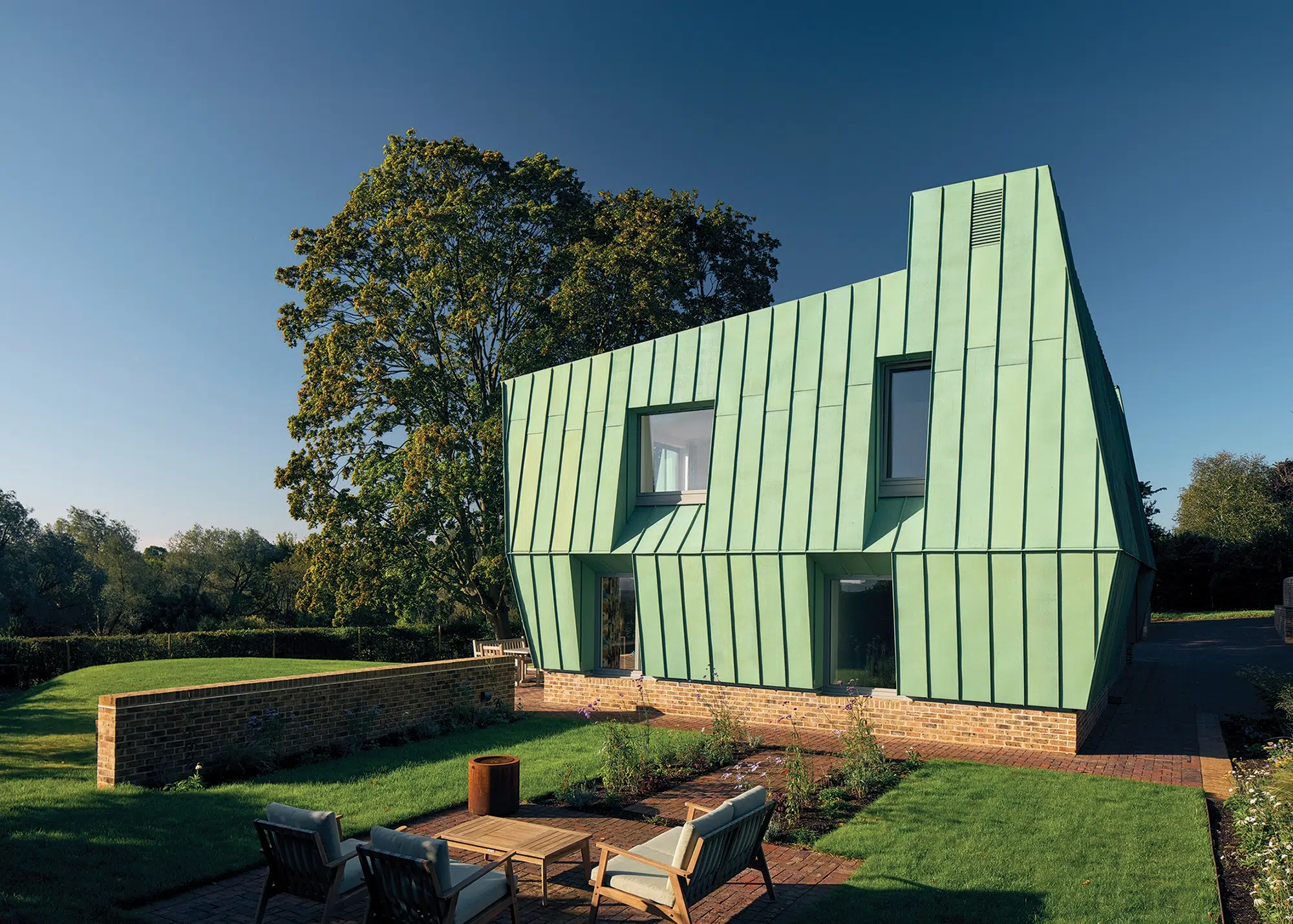 Striking timber frame self build with a copper-clad exterior