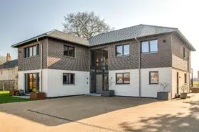 Super Energy-Efficient Turnkey Home Built on a Serene Garden Plot