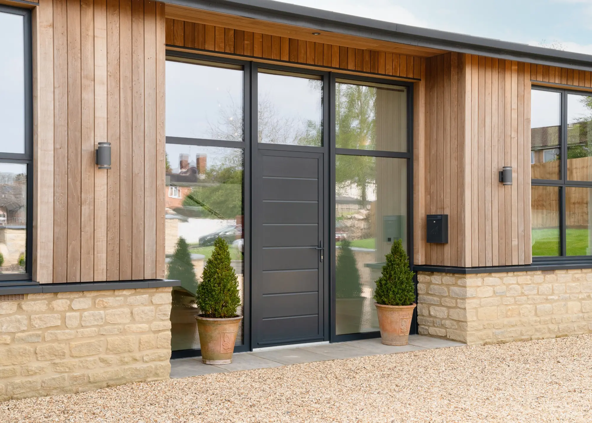 Single-storey self build finished with durable timber cladding