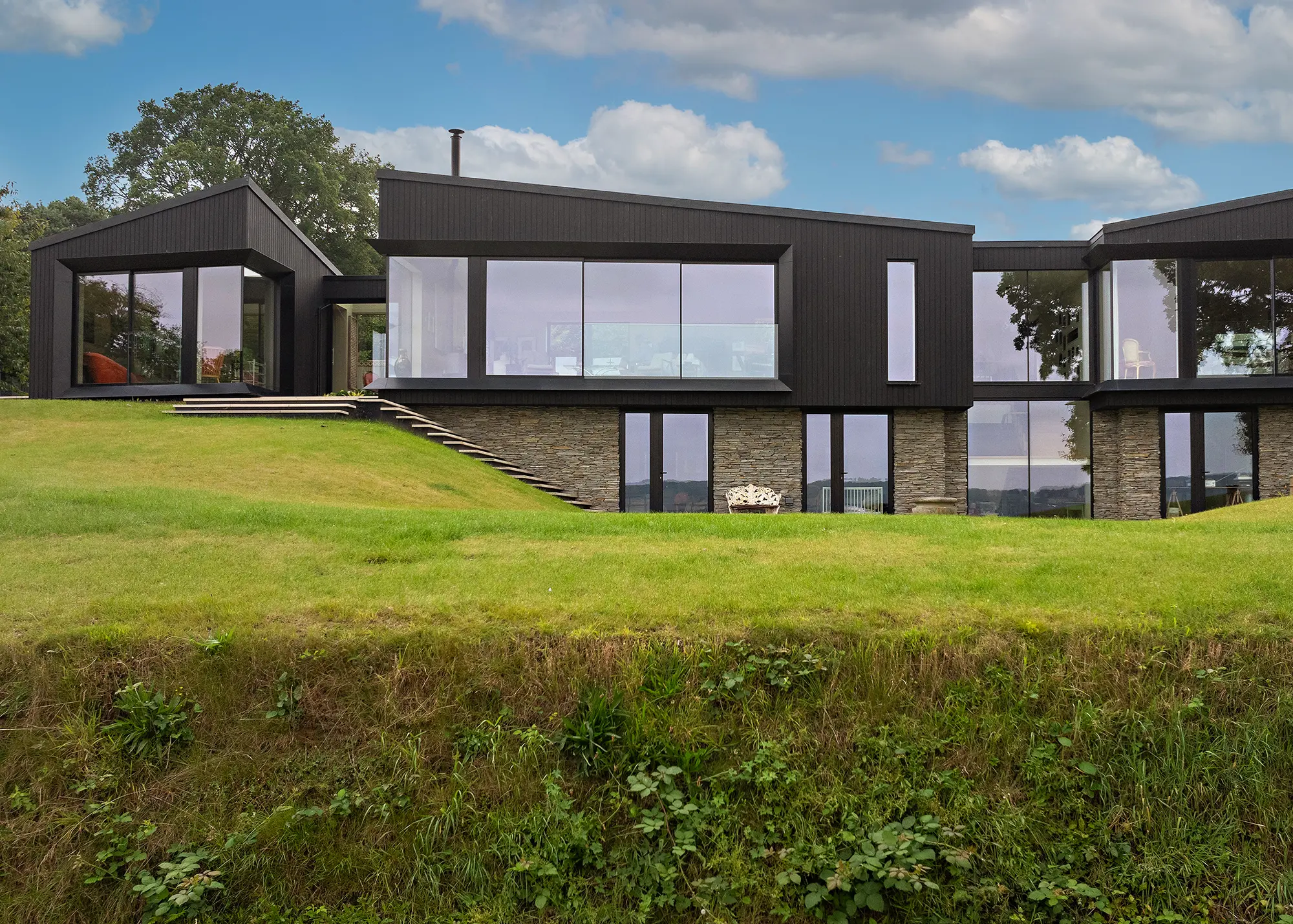 Contemporary new build in Surrey with a modern window design scheme