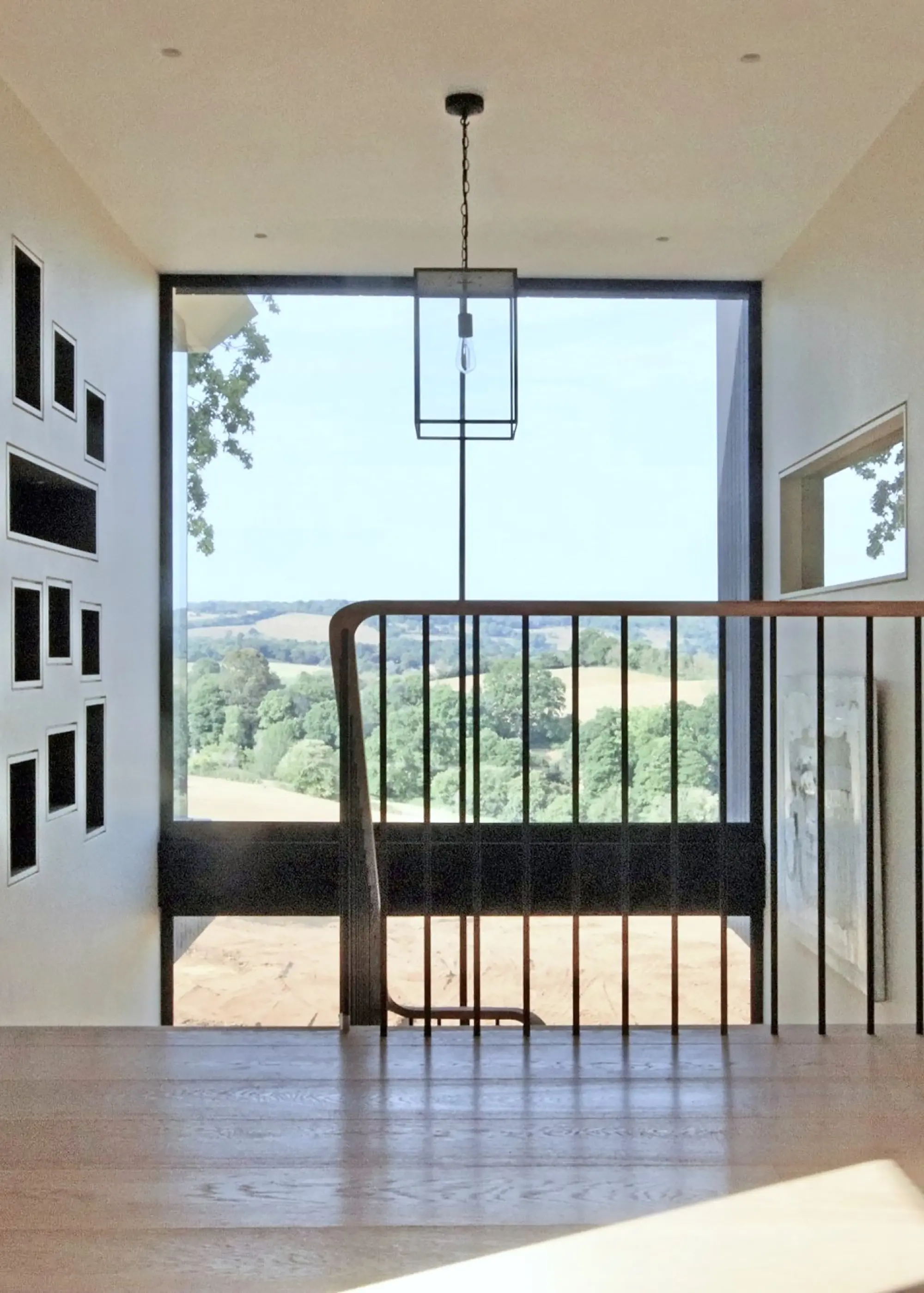 Contemporary new build in Surrey with a modern window design scheme