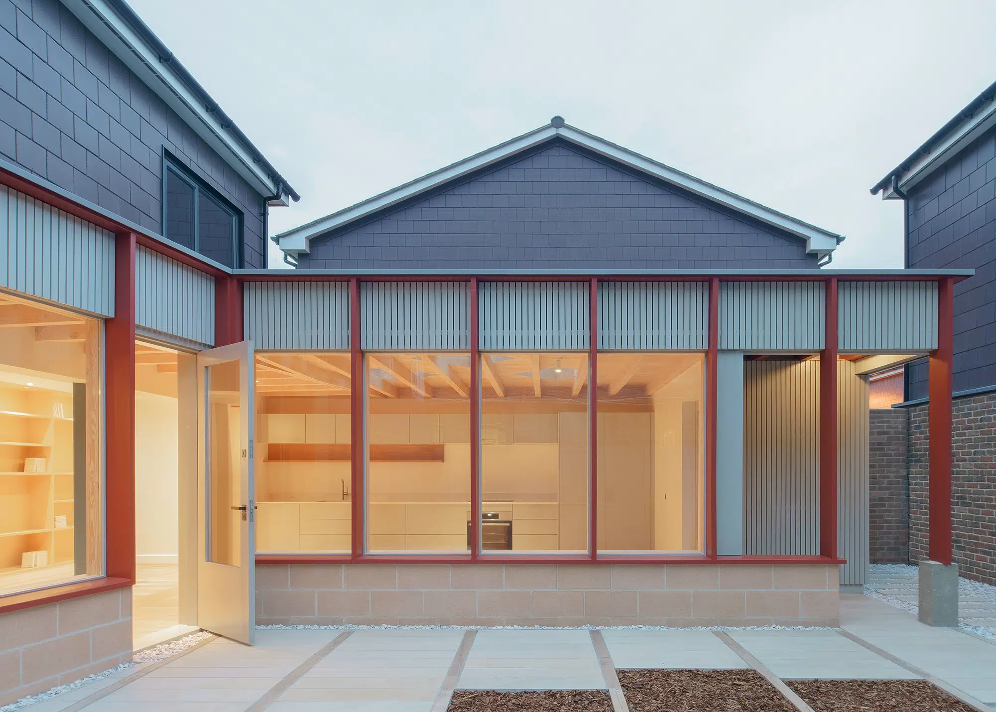 Open-plan timber frame extension with a colourful interior scheme