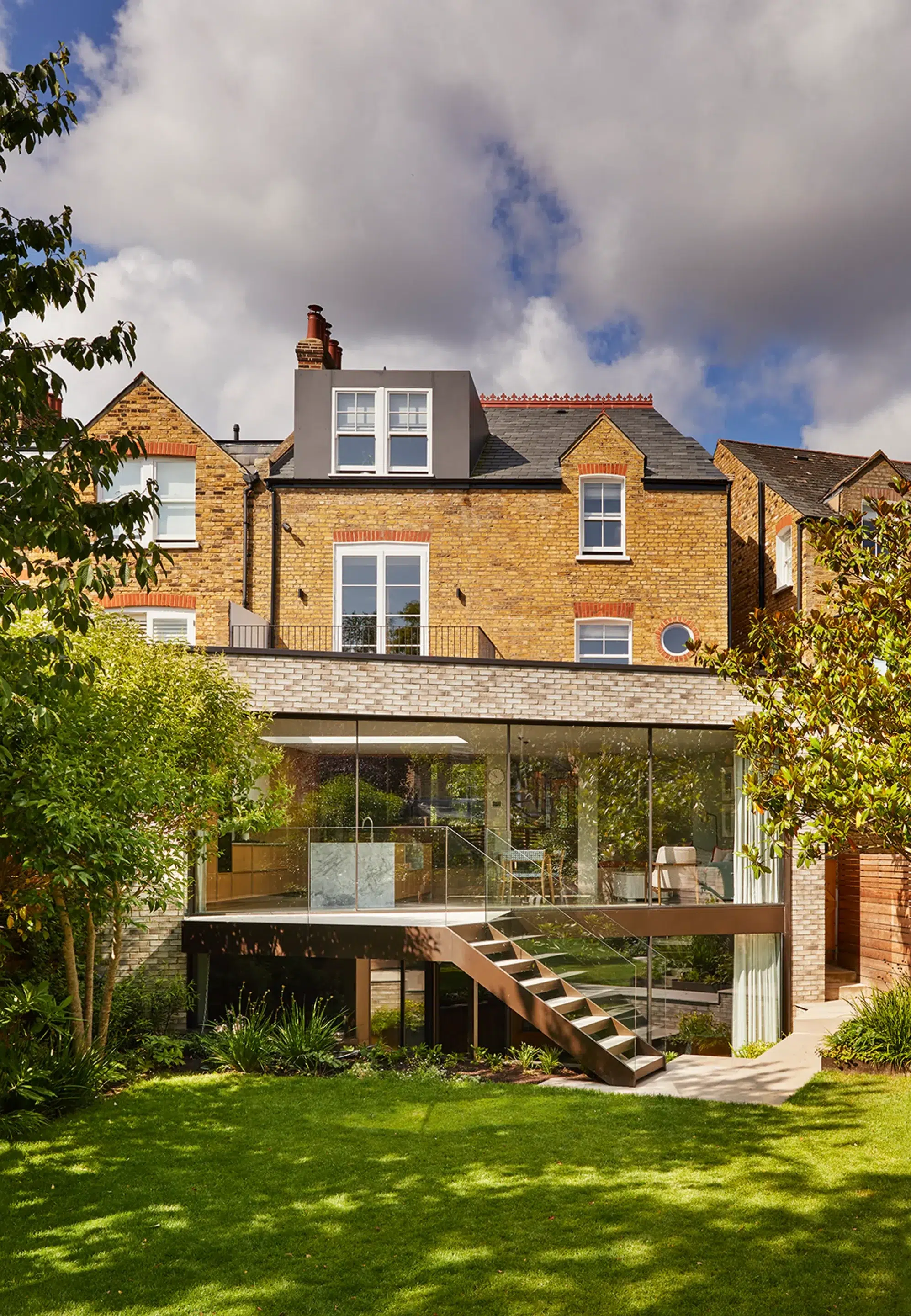 Two-storey rear extension to a semi-detached home with generous glazing