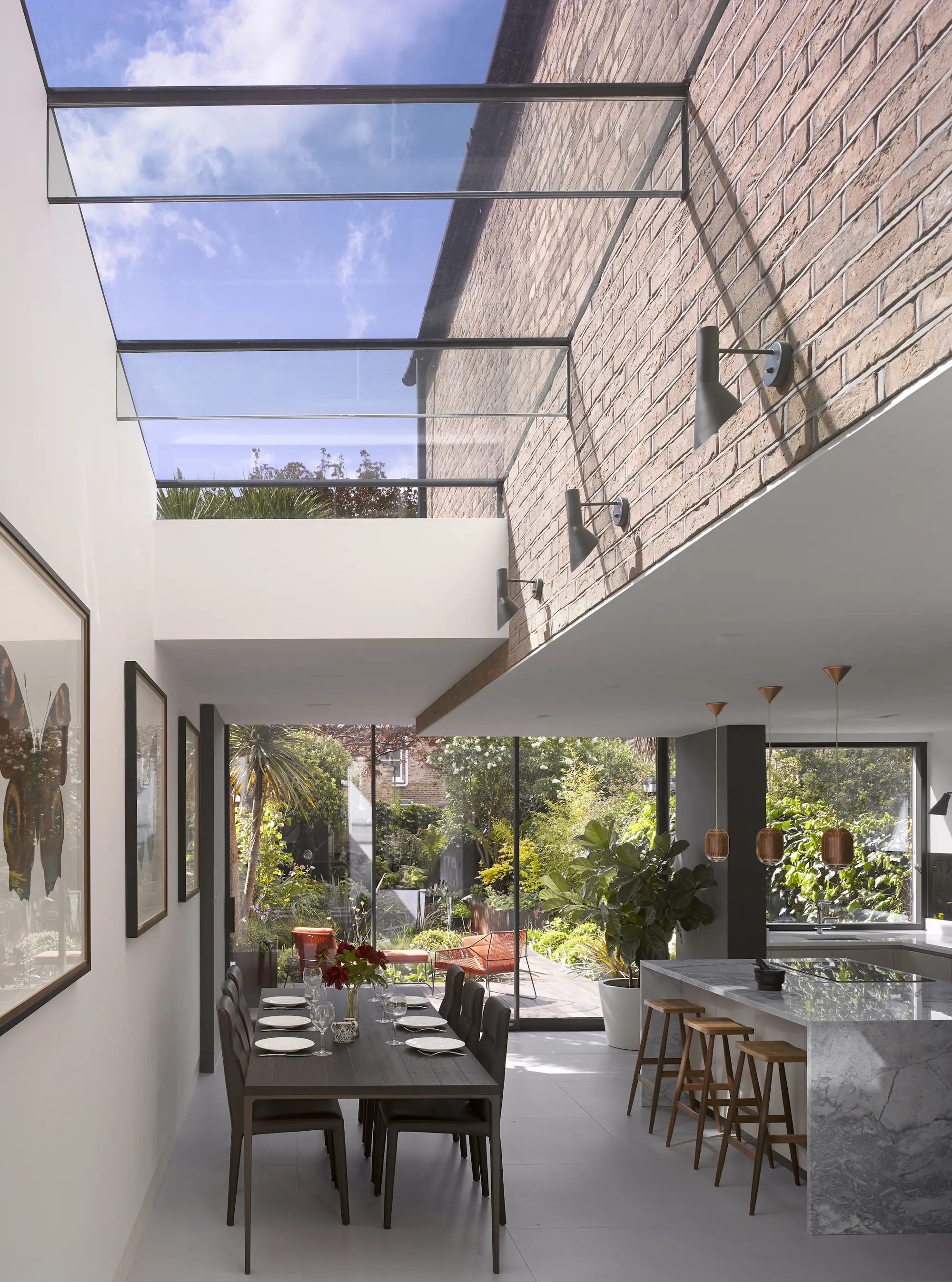 Contemporary infill extension with floor-to-ceiling bay window