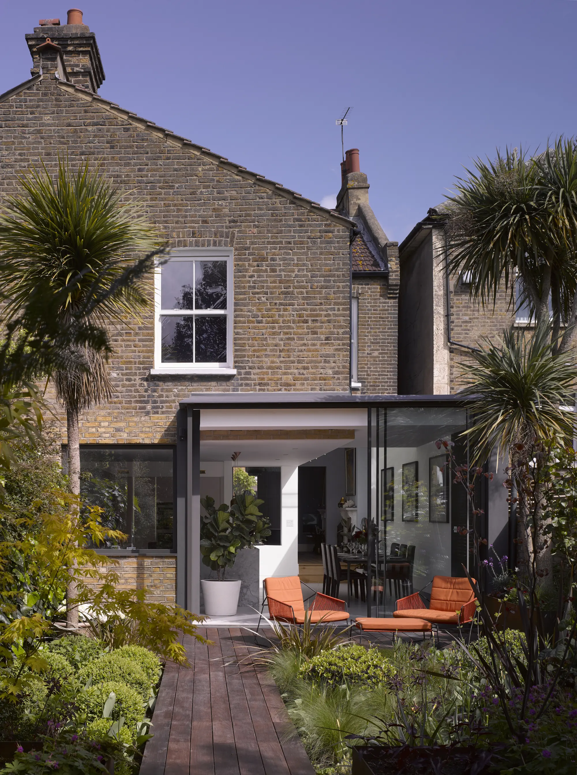 Contemporary infill extension with floor-to-ceiling bay window
