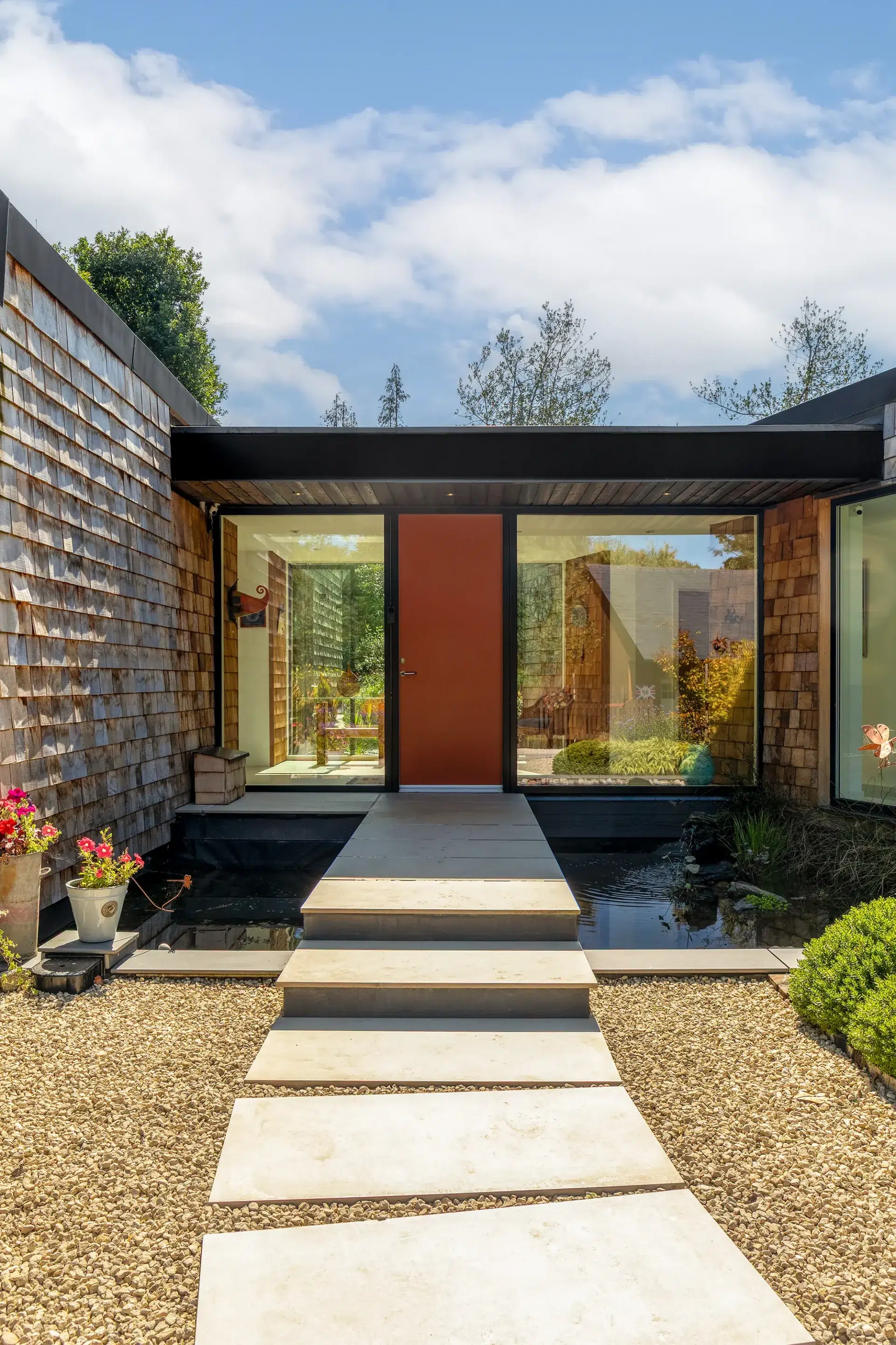 Stunning ICF Home with a Butterfly-Style Split Roof, Set in Beautifully Landscaped Gardens