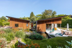 Stunning ICF Home with a Butterfly-Style Split Roof, Set in Beautifully Landscaped Gardens