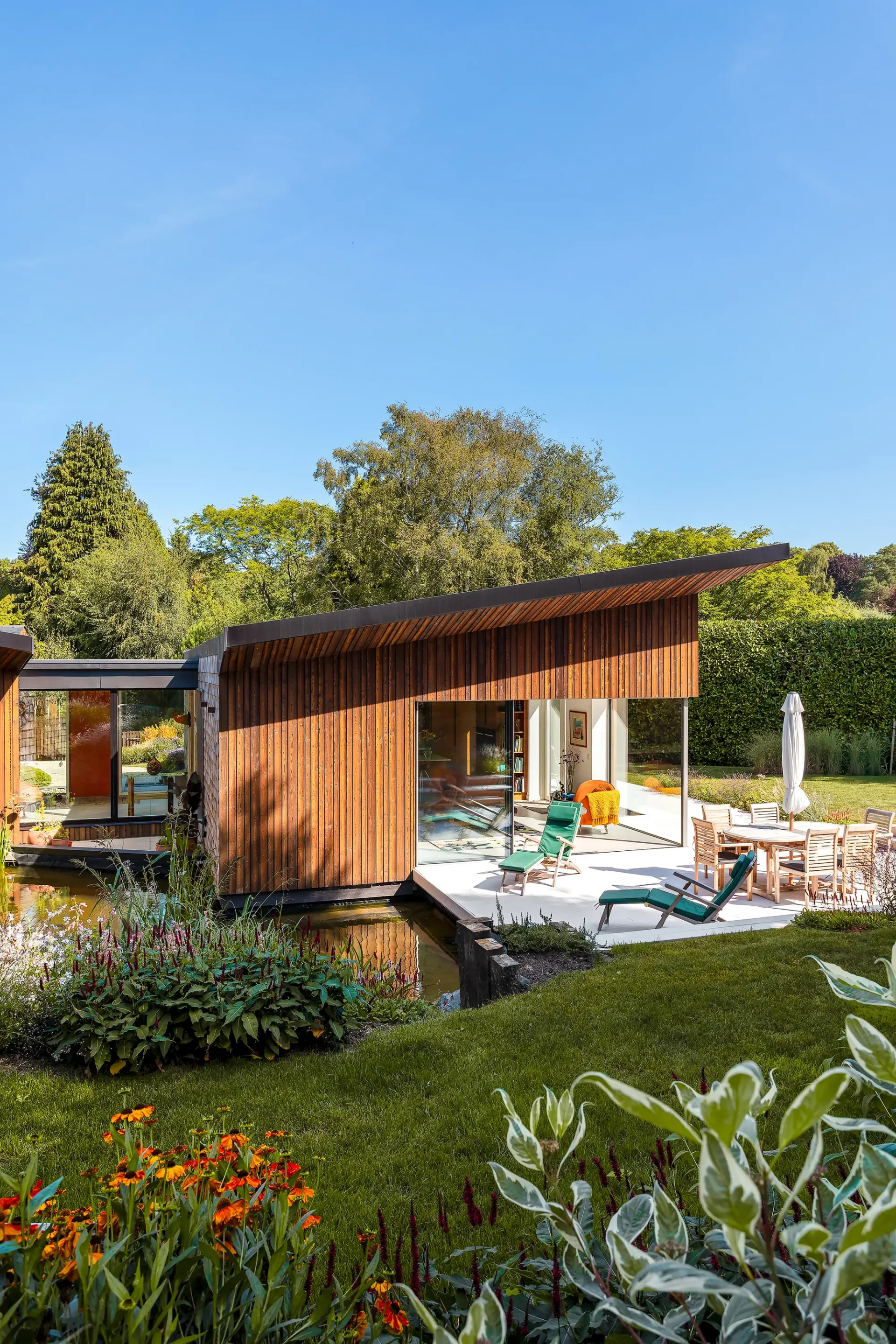 Stunning ICF Home with a Butterfly-Style Split Roof, Set in Beautifully Landscaped Gardens