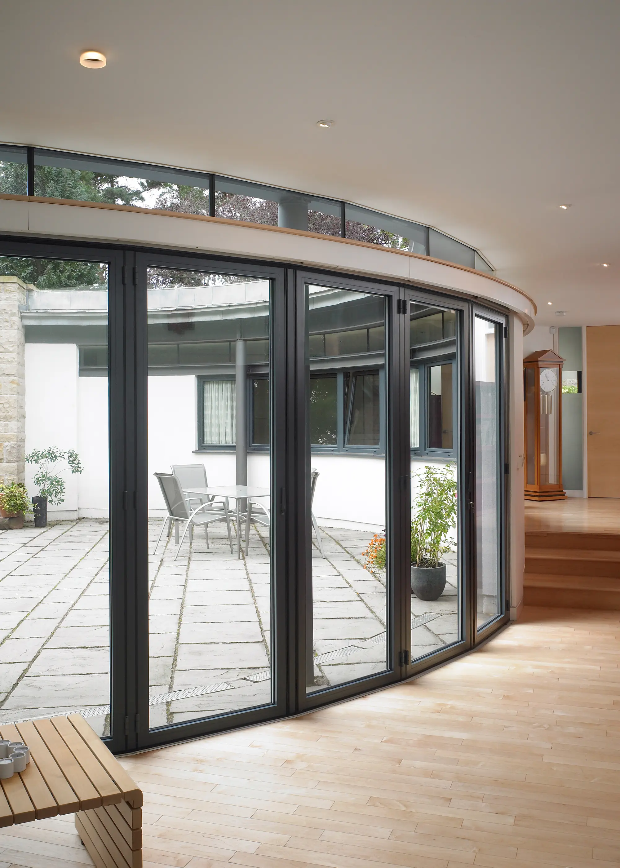 Create a curved opening with bifold doors