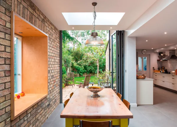 Connect a small opening to the outside with bifold doors