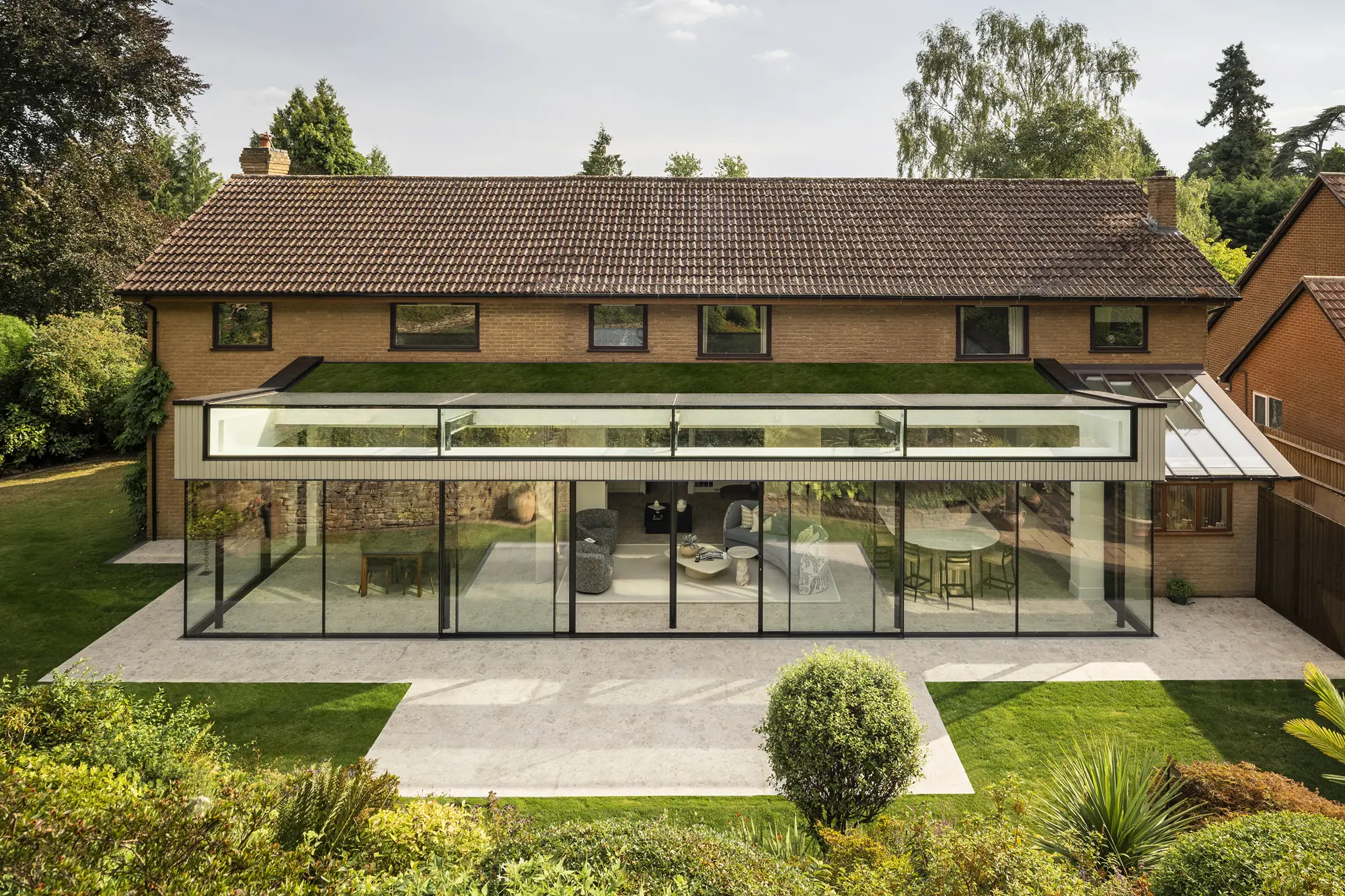 Spectacular glass box extension across the rear